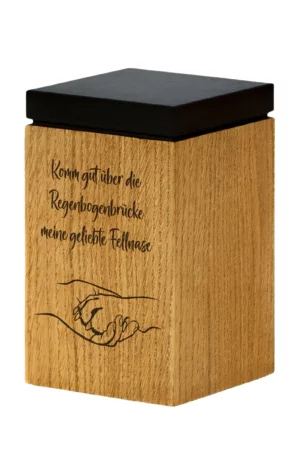 Pet urn with hand holding paw oak wood